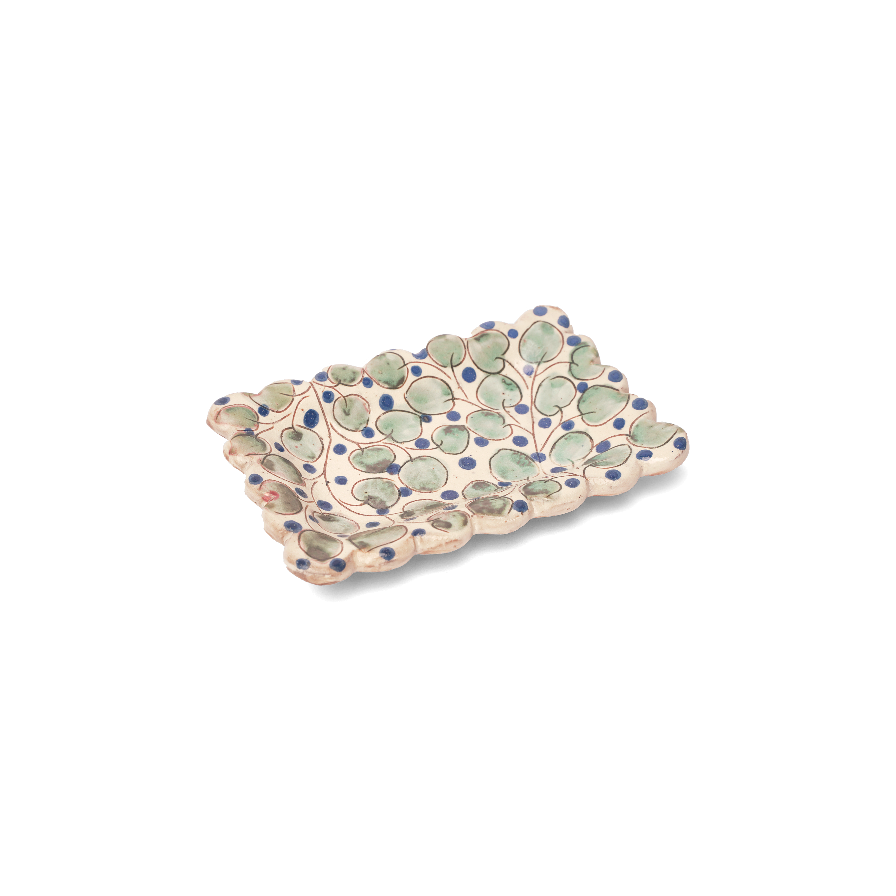 Decorative ceramic tray with pebble design on a white background