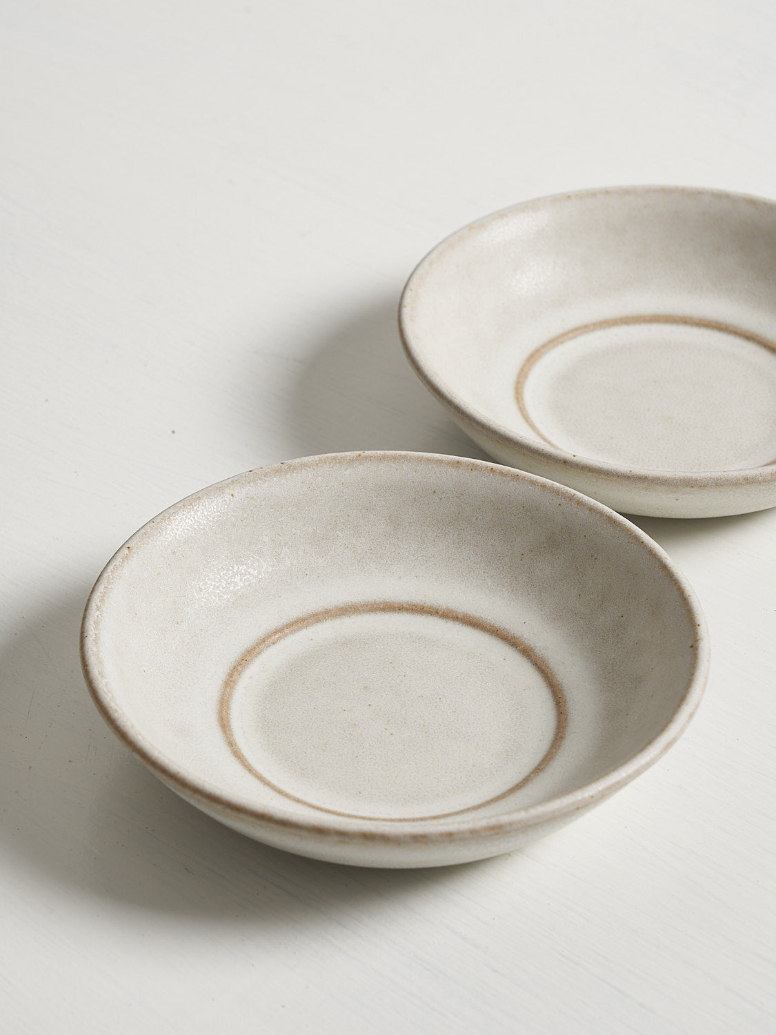 Standard Affair Snack Bowl in oat glaze, overhead view