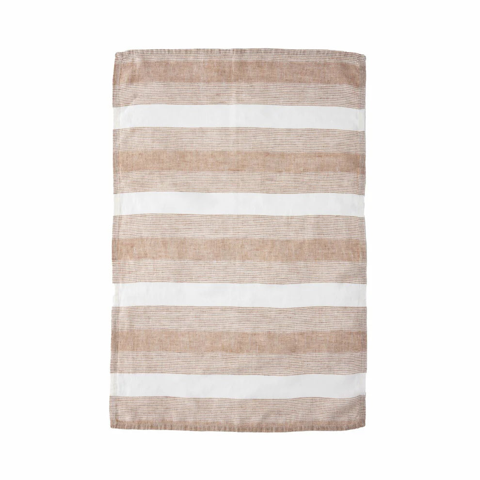 Striped rug with brown and white stripes on a white background