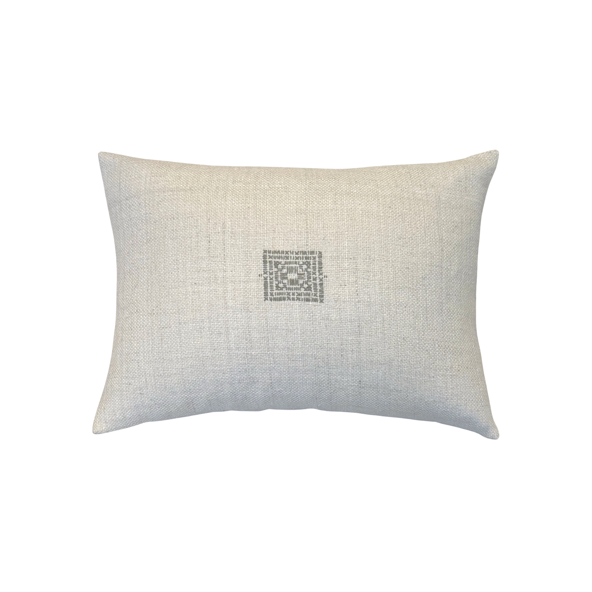 Textured rectangular cream colored pillow with an embroidered pattern in sage thread.