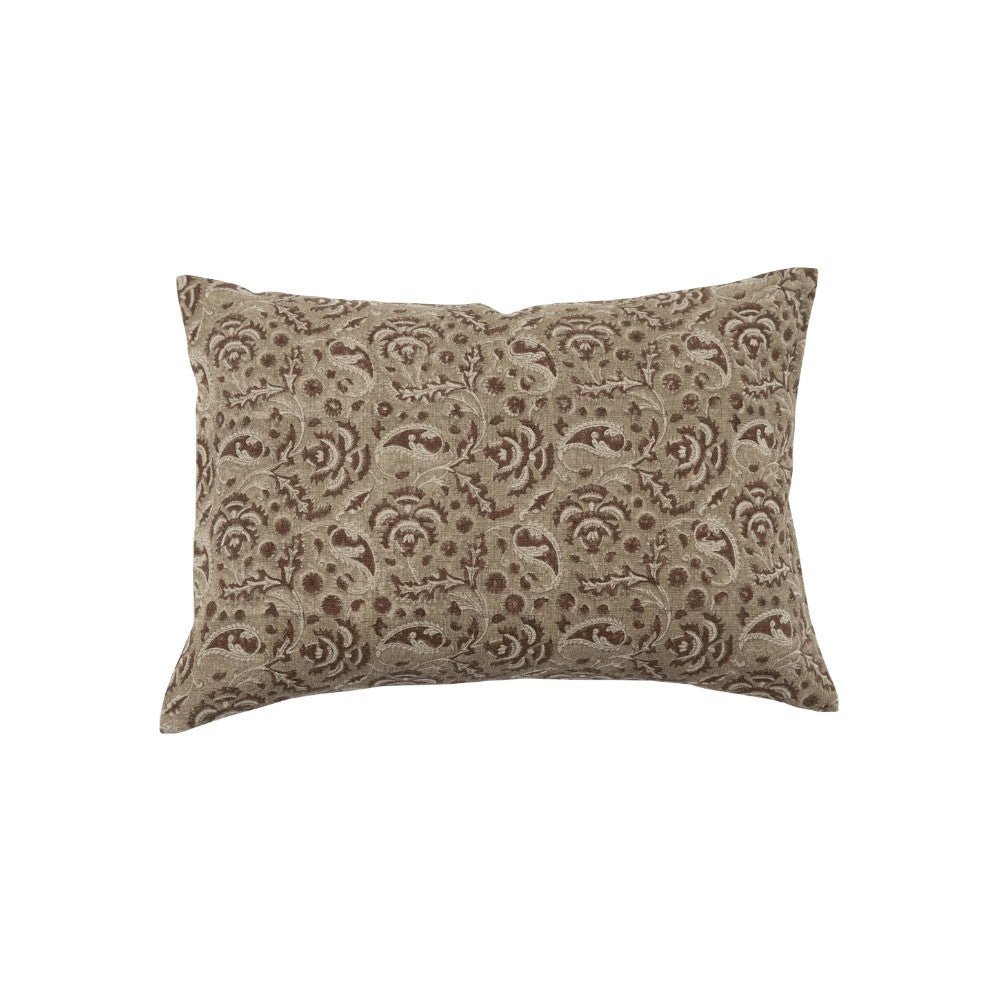 Filling Spaces Bari Mud lumbar pillow in natural linen with a hand-block-printed floral motif in soft green and brown.