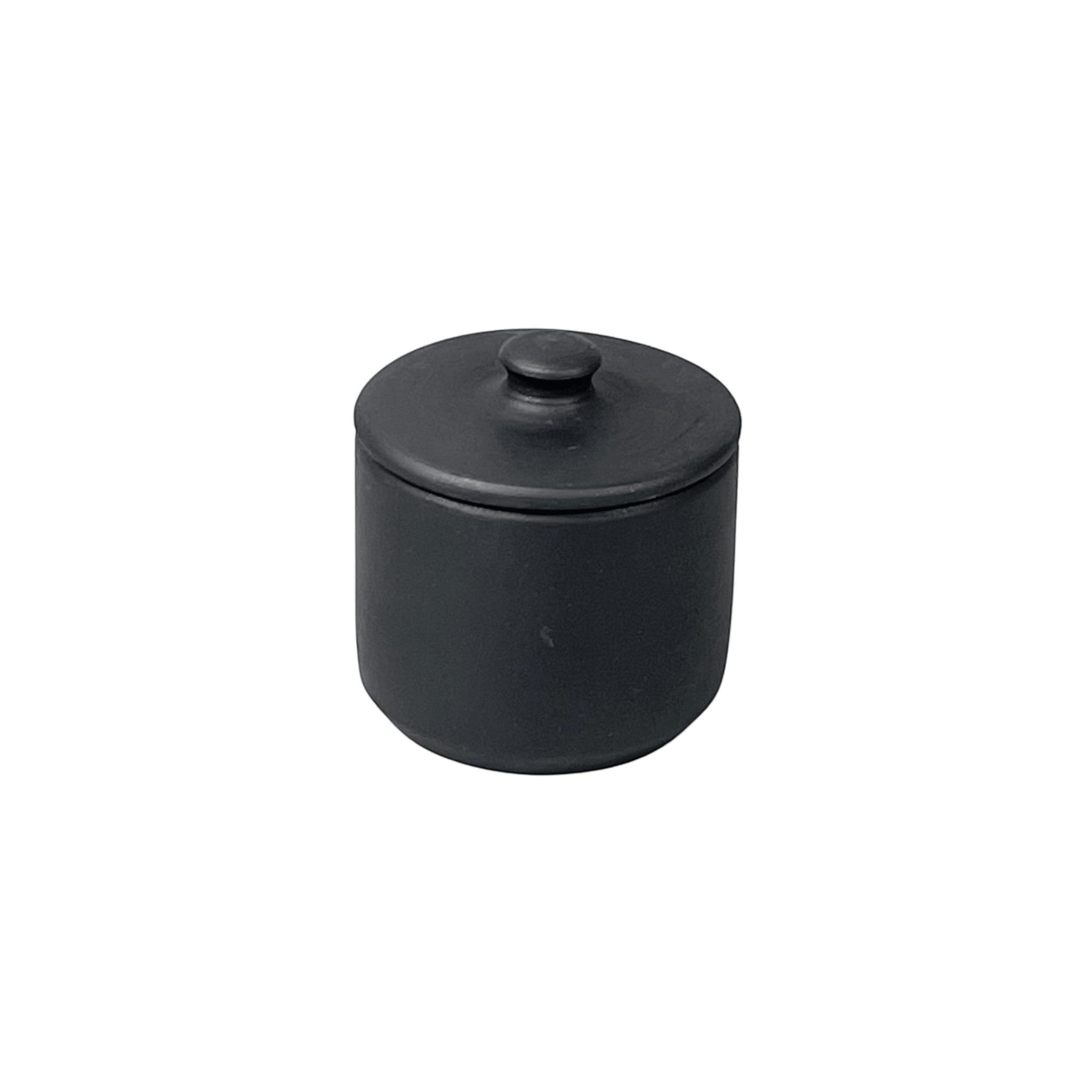 Bitters Co matte black barro clay sugar bowl with a minimalist cylindrical design and matching lid.