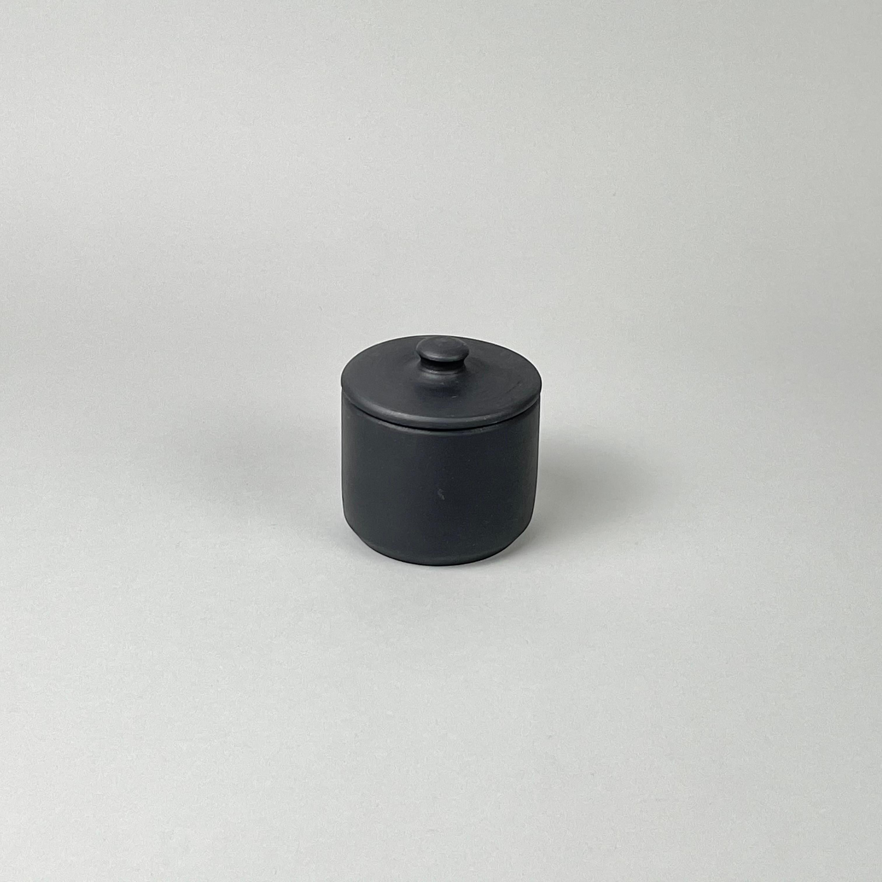 Bitters Co Bitters Co Barro sugar bowl in matte black clay with a minimalist cylindrical design and fitted lid.