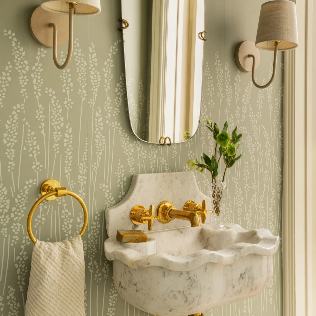 Powder room in Farrow & Ball Feather Grass wallpaper with a carved marble sink, Calimia Home Greenway project