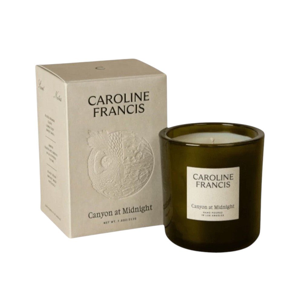 Calimia Home Canyon at Midnight scented candle in a dark glass jar with matching embossed cream gift box.