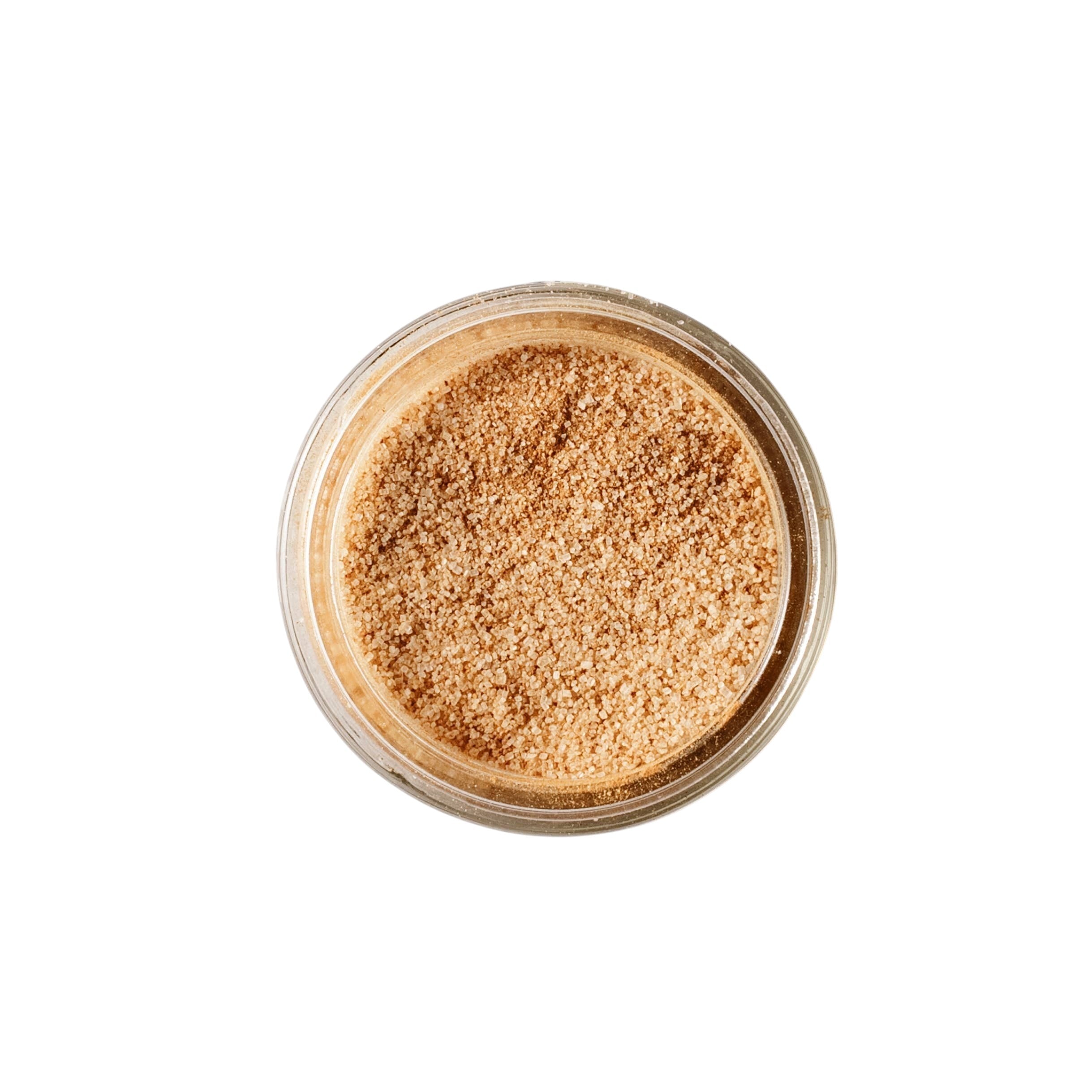 Calicutts cinnamon sugar blend in a small glass jar, featuring a mix of Ceylon, Korintje, and Saigon cinnamons.