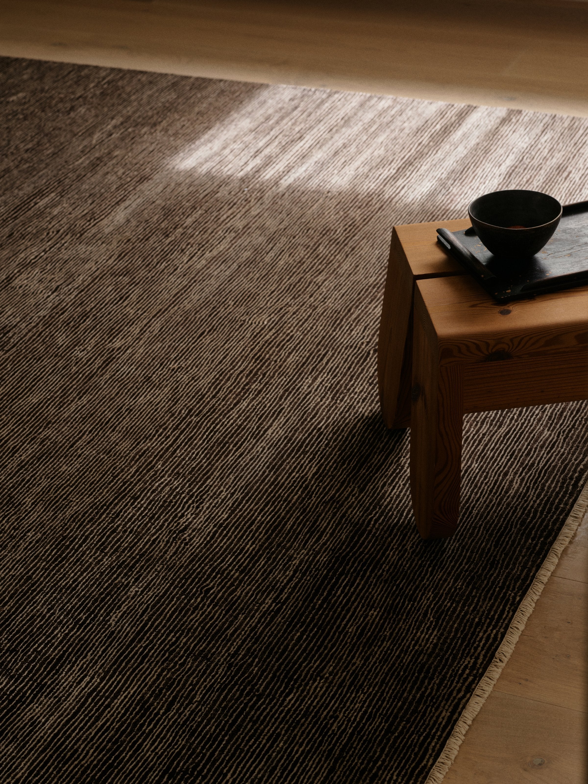 Corsica Rug by Armadillo, handwoven wool and linen rug, styled in a room at Calimia Home