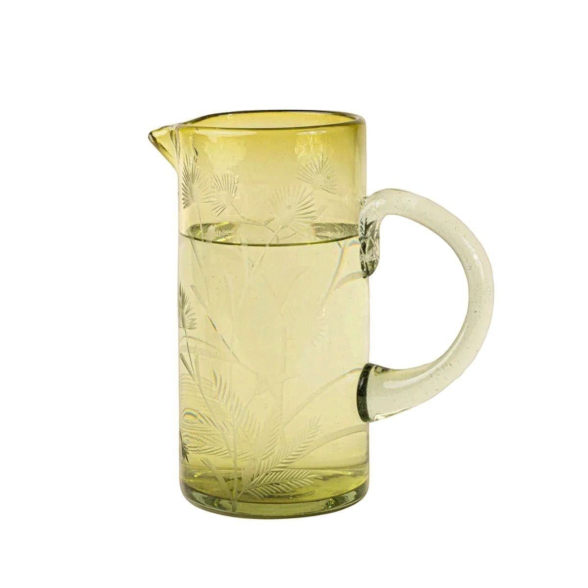 Calimia Home hand-blown olive recycled glass pitcher featuring a delicate etched thistle floral motif.