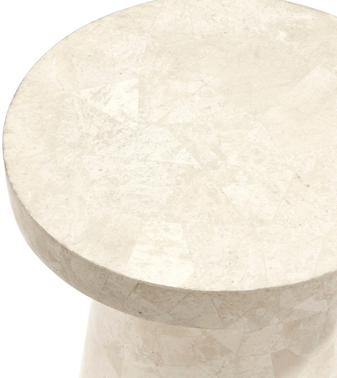 Foley Stone Outdoor Side Table in a garden patio setting