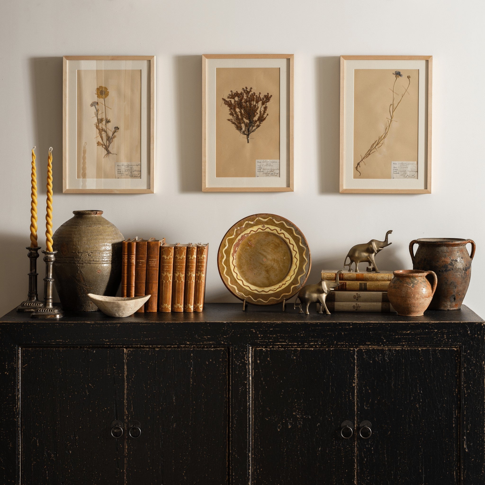 Vintage green glazed pot shown in a styled interior setting