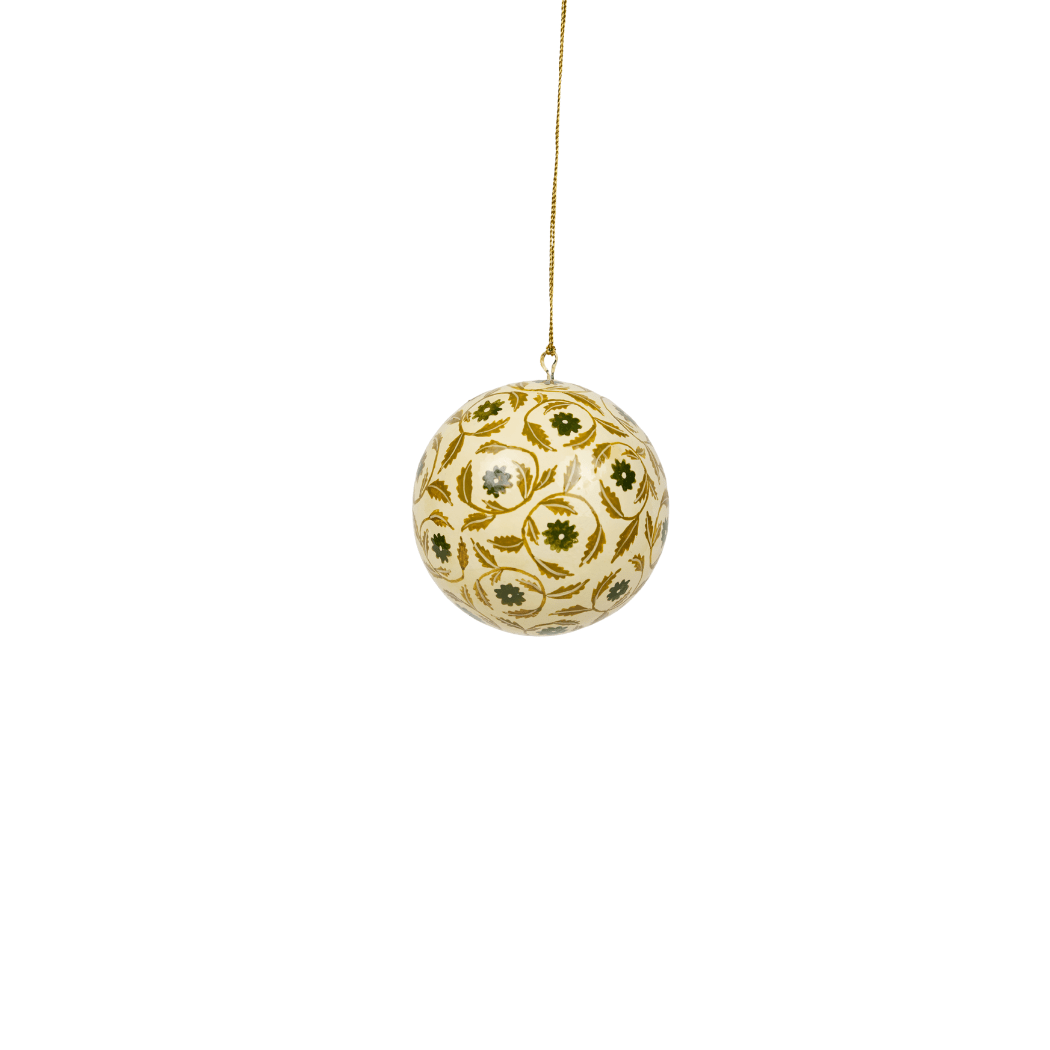 Maison Poire Marguerite hand-painted ornament in olive hanging from a gold cord