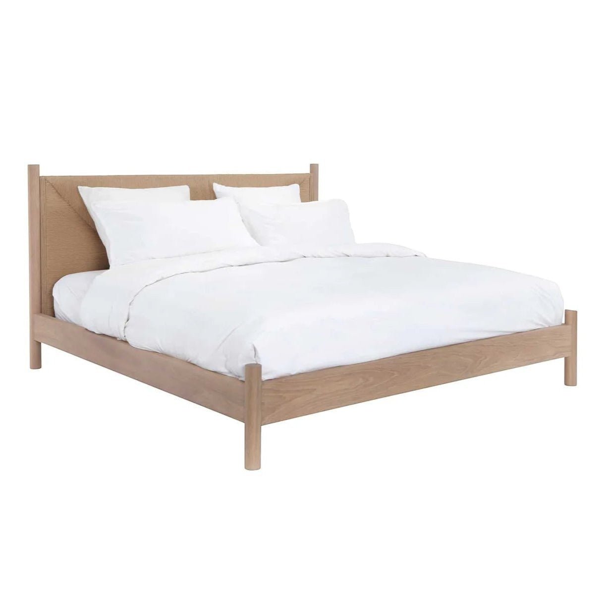 Calimia Home Kelma Bed in natural oak with a hand-woven paper cord headboard and white bedding