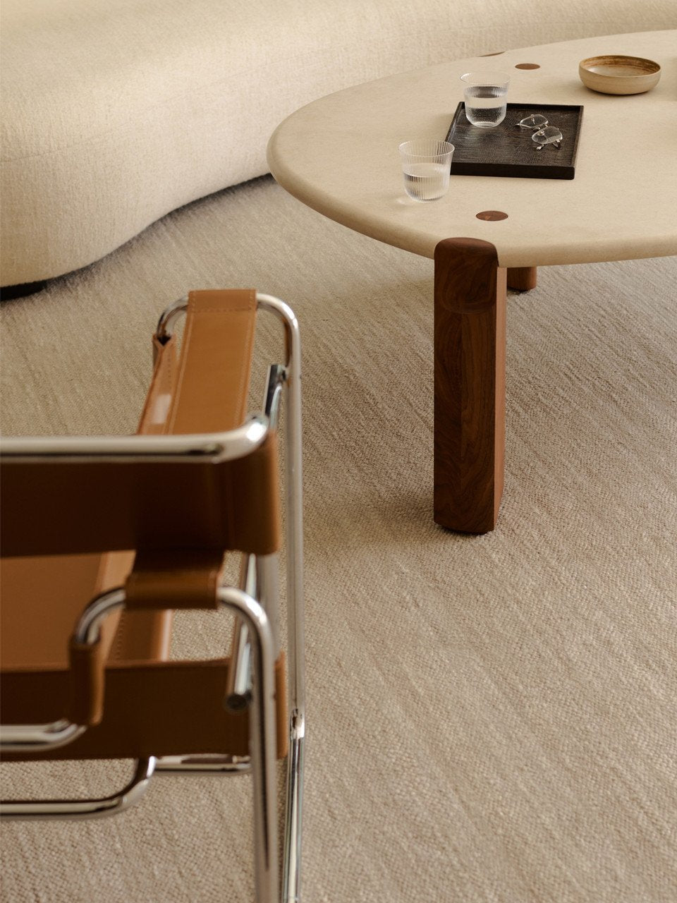 Armadillo Latitude Rug in Beluga, handwoven linen flatweave rug shown in a room setting