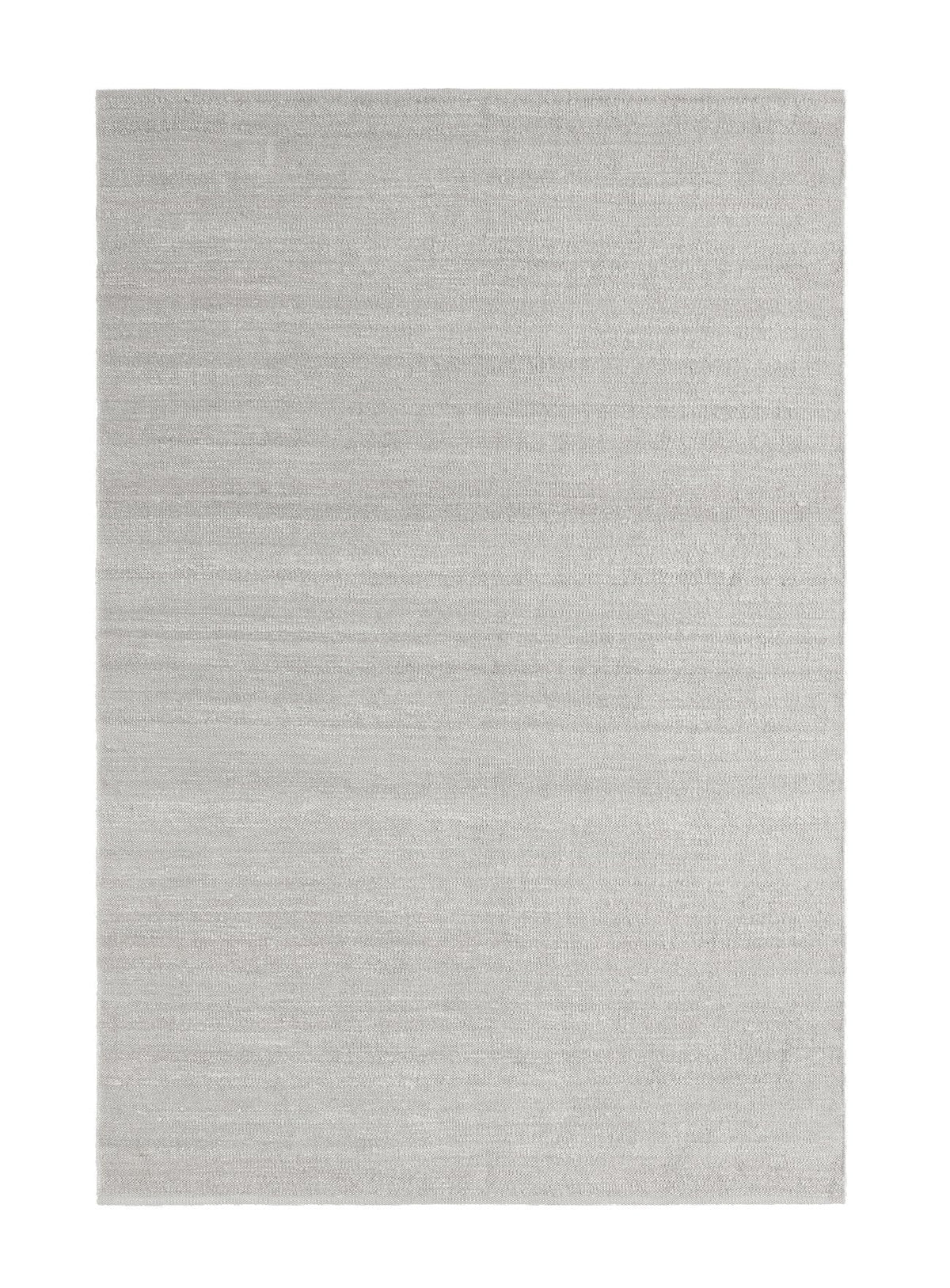Armadillo Latitude Rug in Beluga, overhead view of the handwoven linen flatweave weave and edge finish