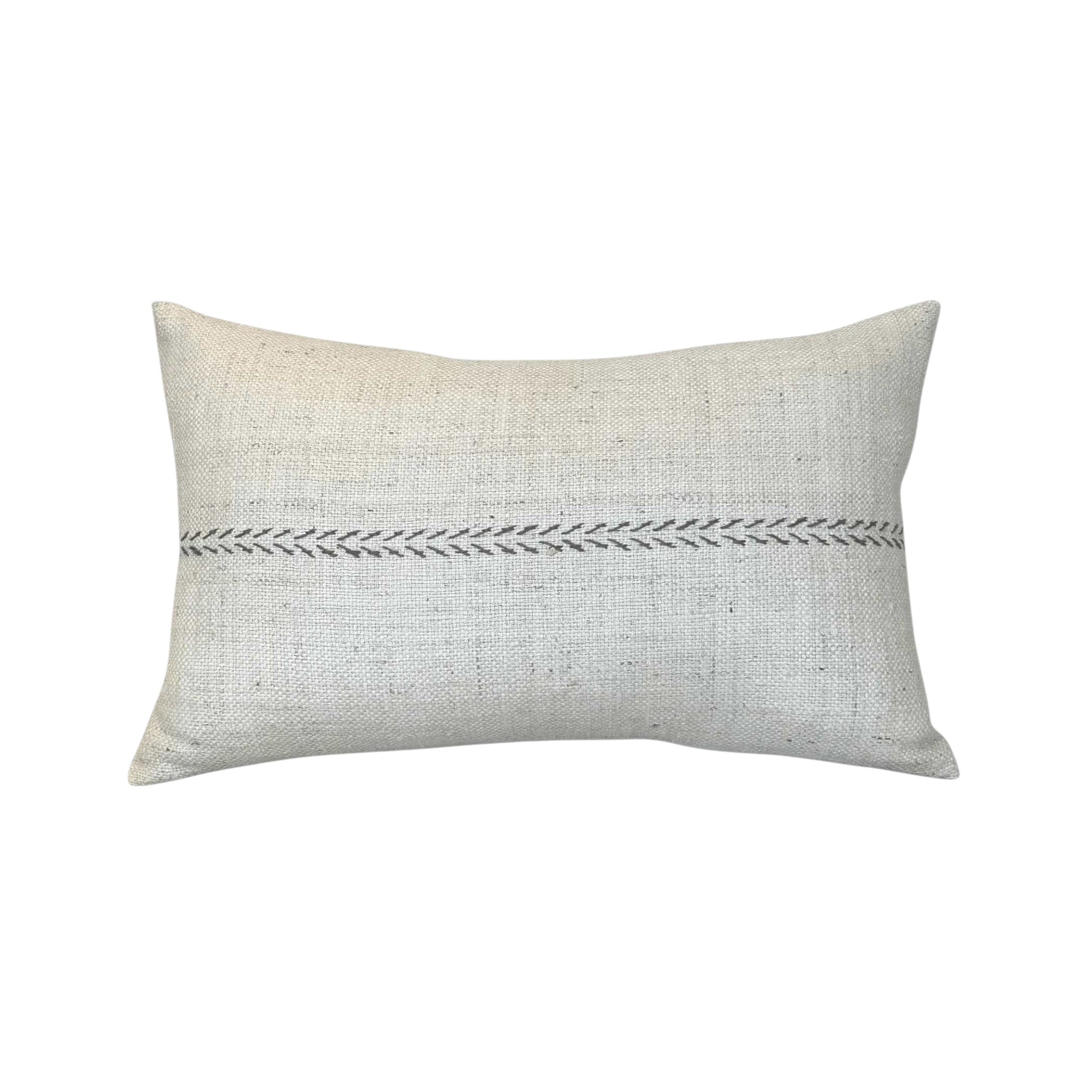 Linea Ivory and Chocolate Lumbar Pillow by One Bi One — Belgian linen with hand-embroidered chocolate wool arrow pattern, 20" × 12", handcrafted in Gothenburg, Sweden