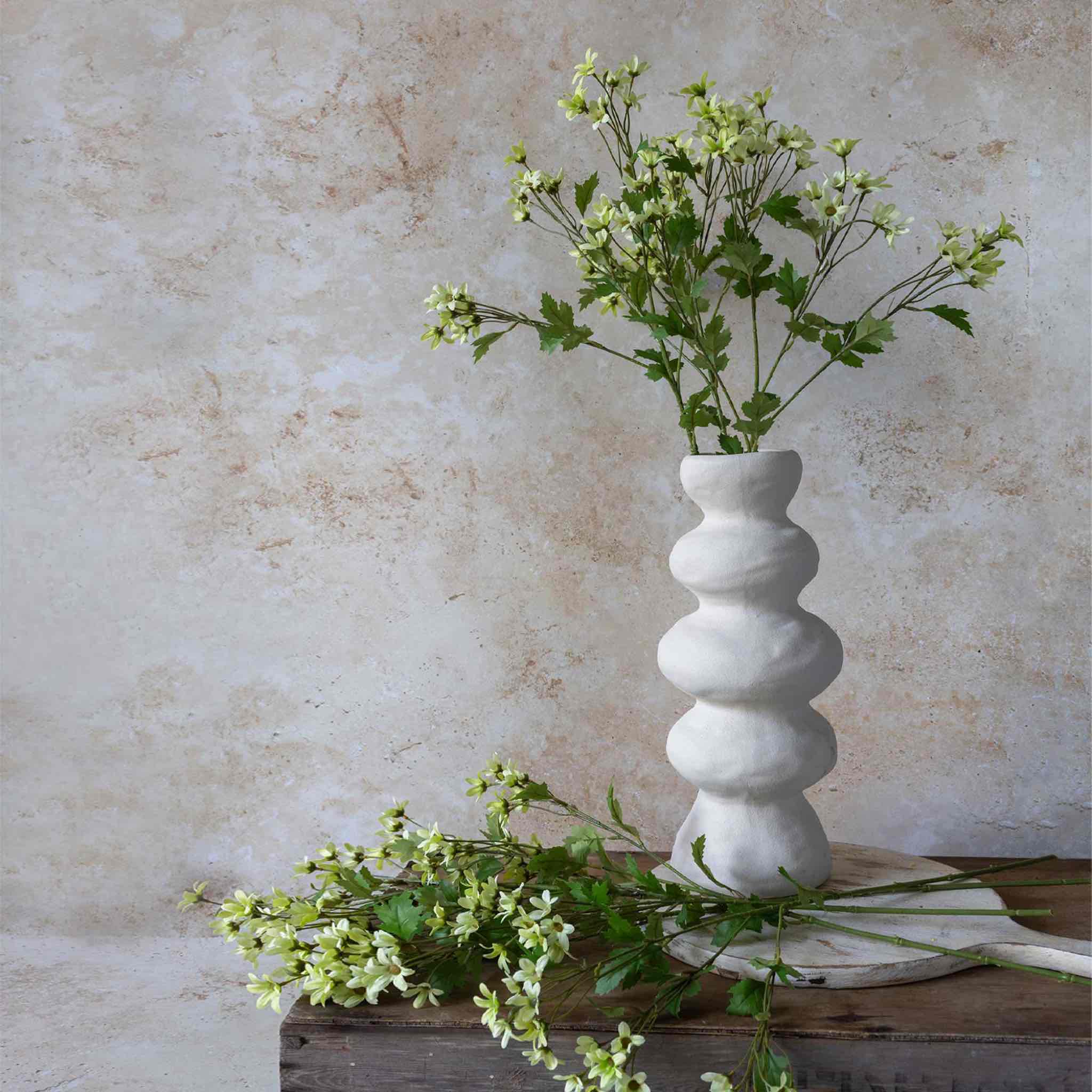 Artificial Meadow Daisy by Abigail Ahern styled in a vase, showing soft bloom tones and naturalistic stem
