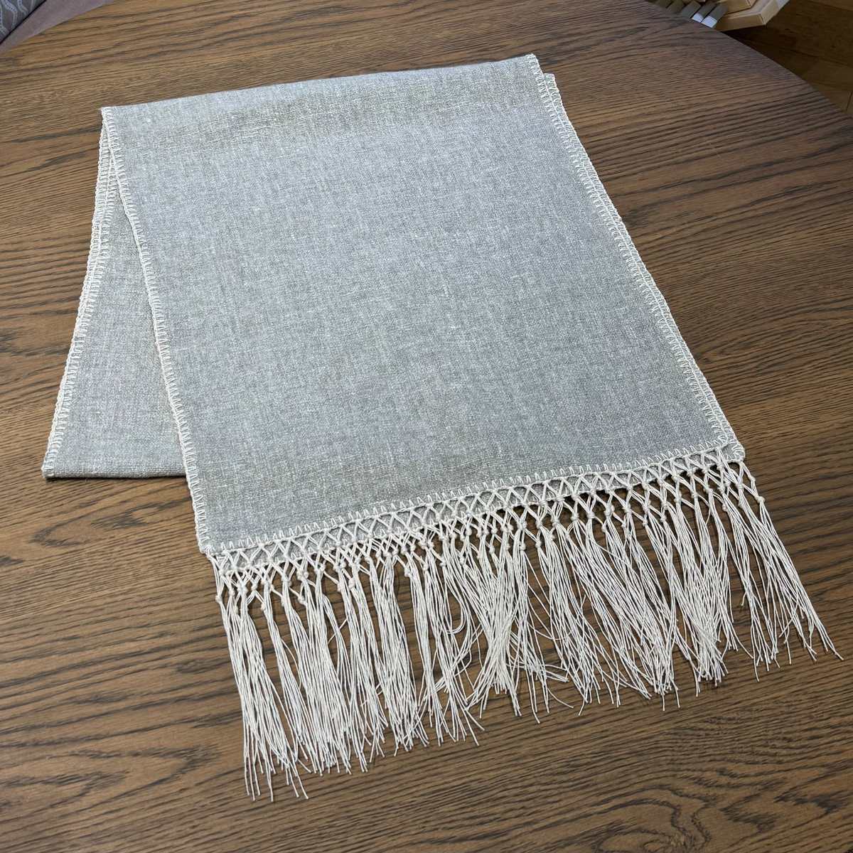 Elise Gray & Cream Table Runner by One Bi One — Belgian linen with hand-embroidered gray and cream accent and tassels, handcrafted in Gothenburg, Sweden