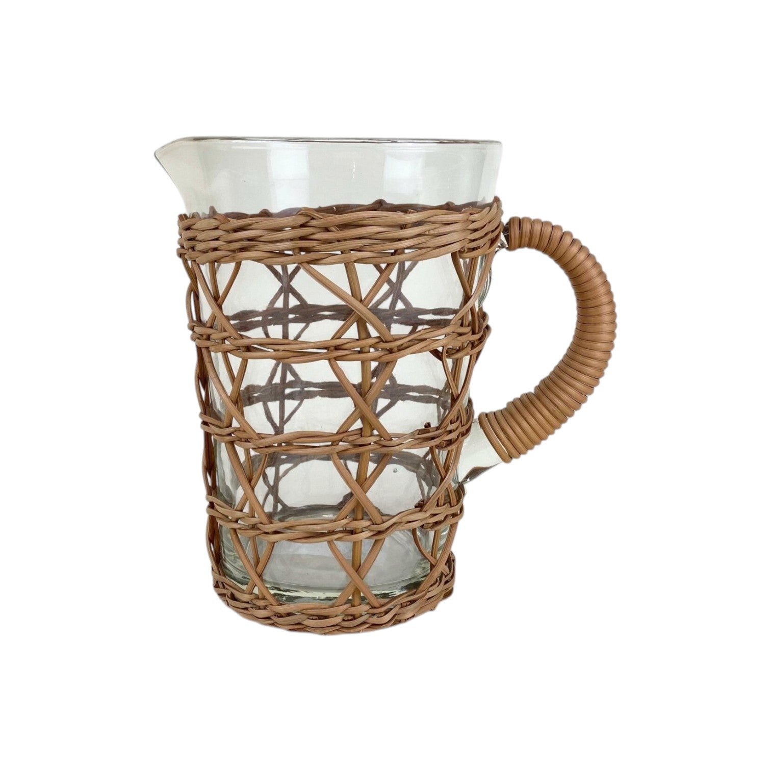 Calimia Home clear glass pitcher wrapped in handwoven natural seagrass with a sturdy rattan handle