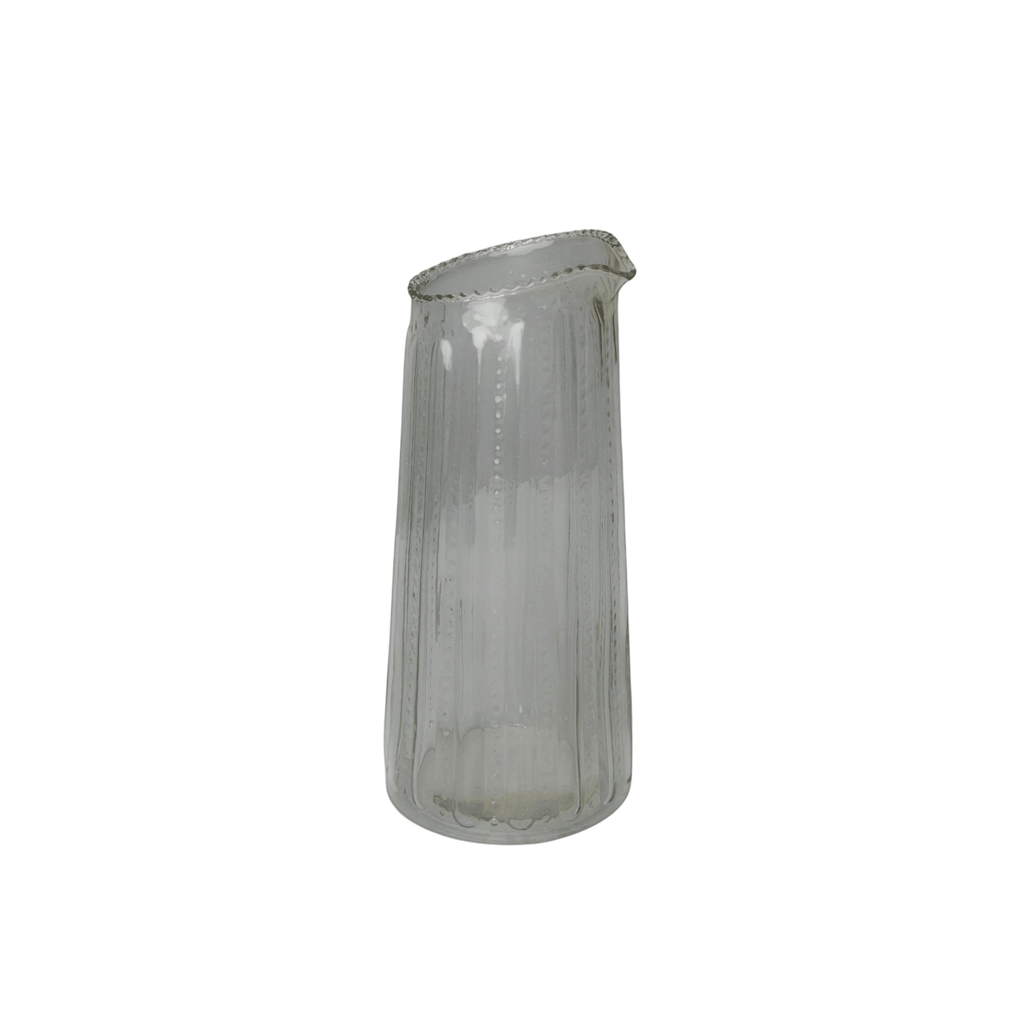 Be Home Ruffle Glass Lines Carafe with a clear, ribbed texture and elegant scalloped rim for serving drinks.
