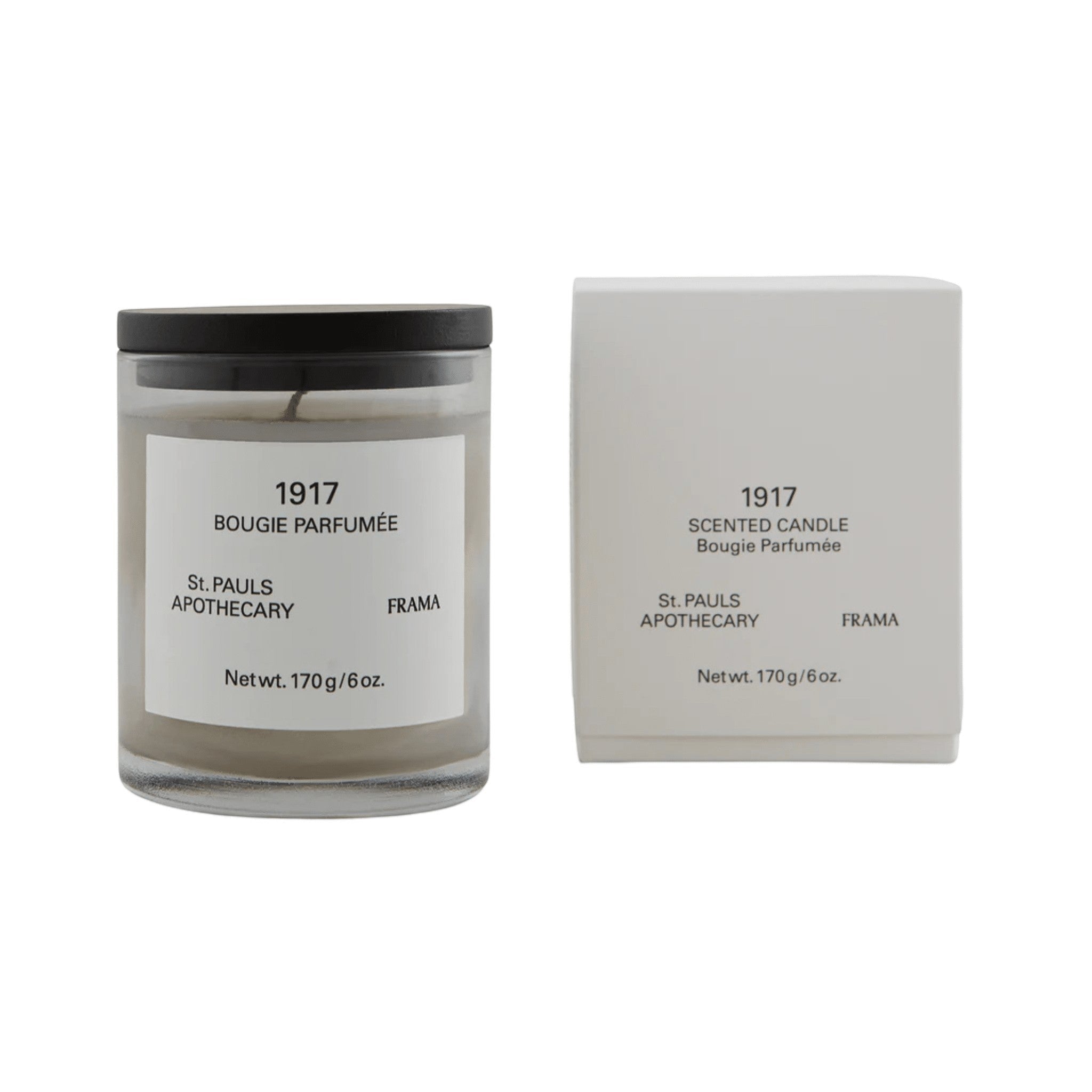 Frama 1917 scented candle in a glass jar with a black lid and matching white box, featuring floral earthy notes.