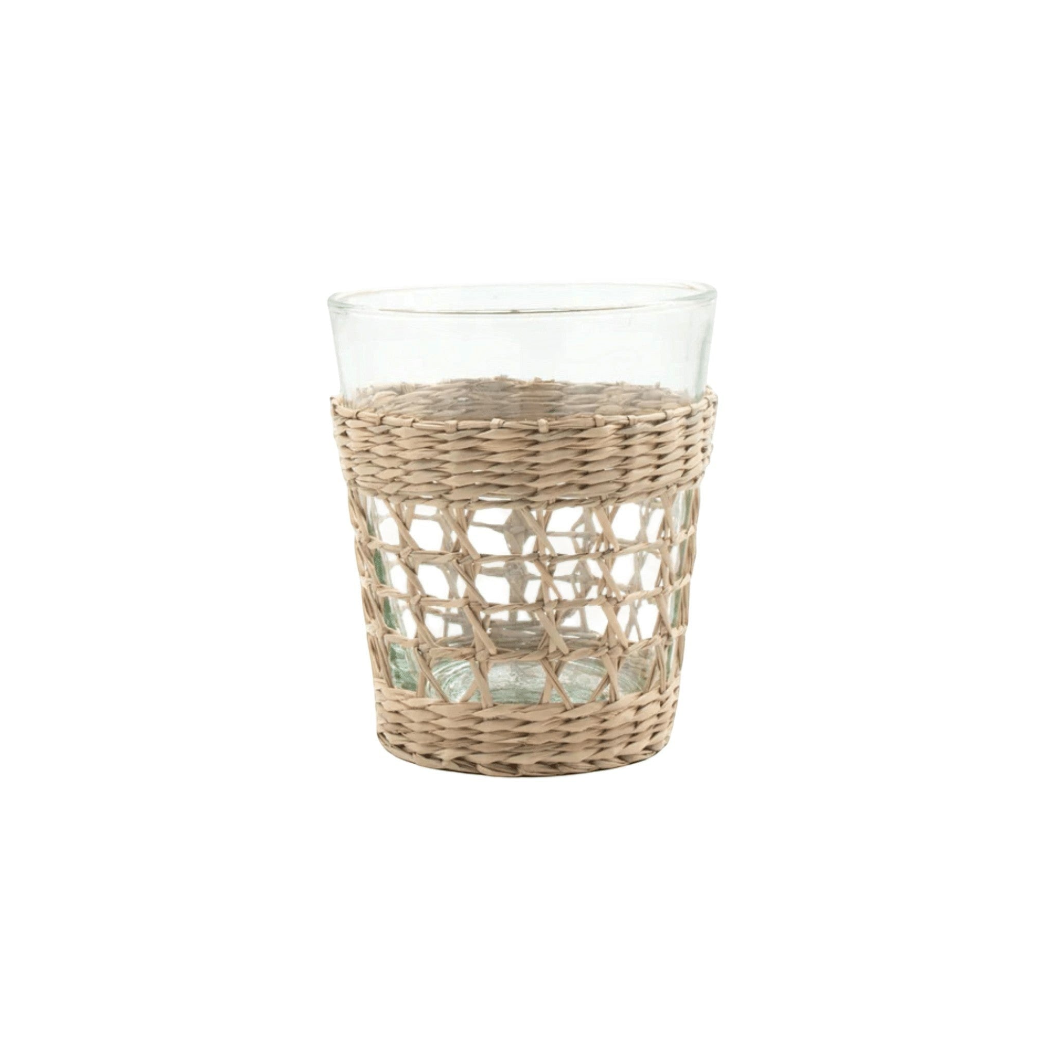 Calimia Home clear glass tumbler featuring a removable handwoven natural seagrass cage wrap for a coastal aesthetic.