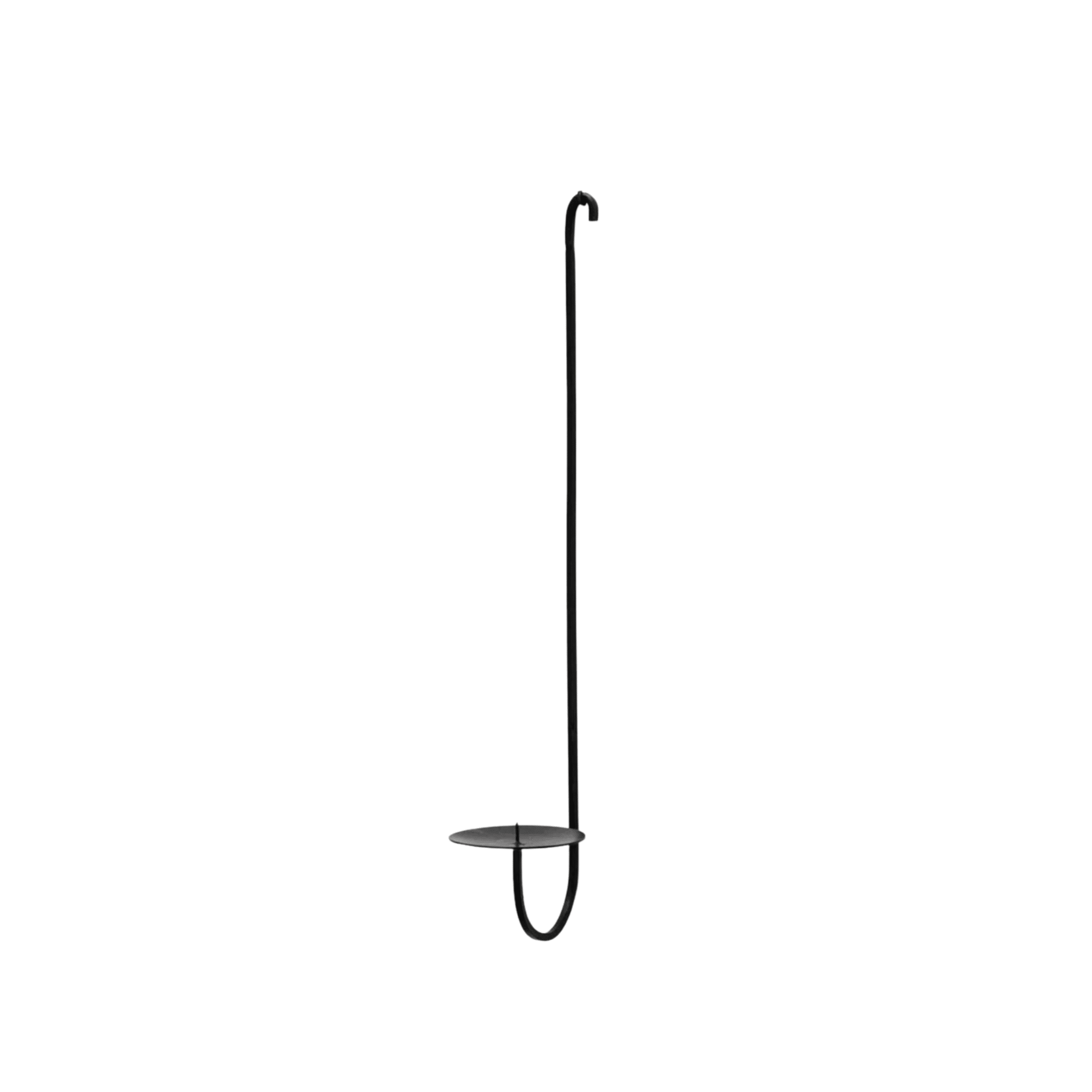 Single black iron wall candle holder with a minimalist U-shaped design and round base plate for holding a taper candle, featuring a hook at the top for hanging.