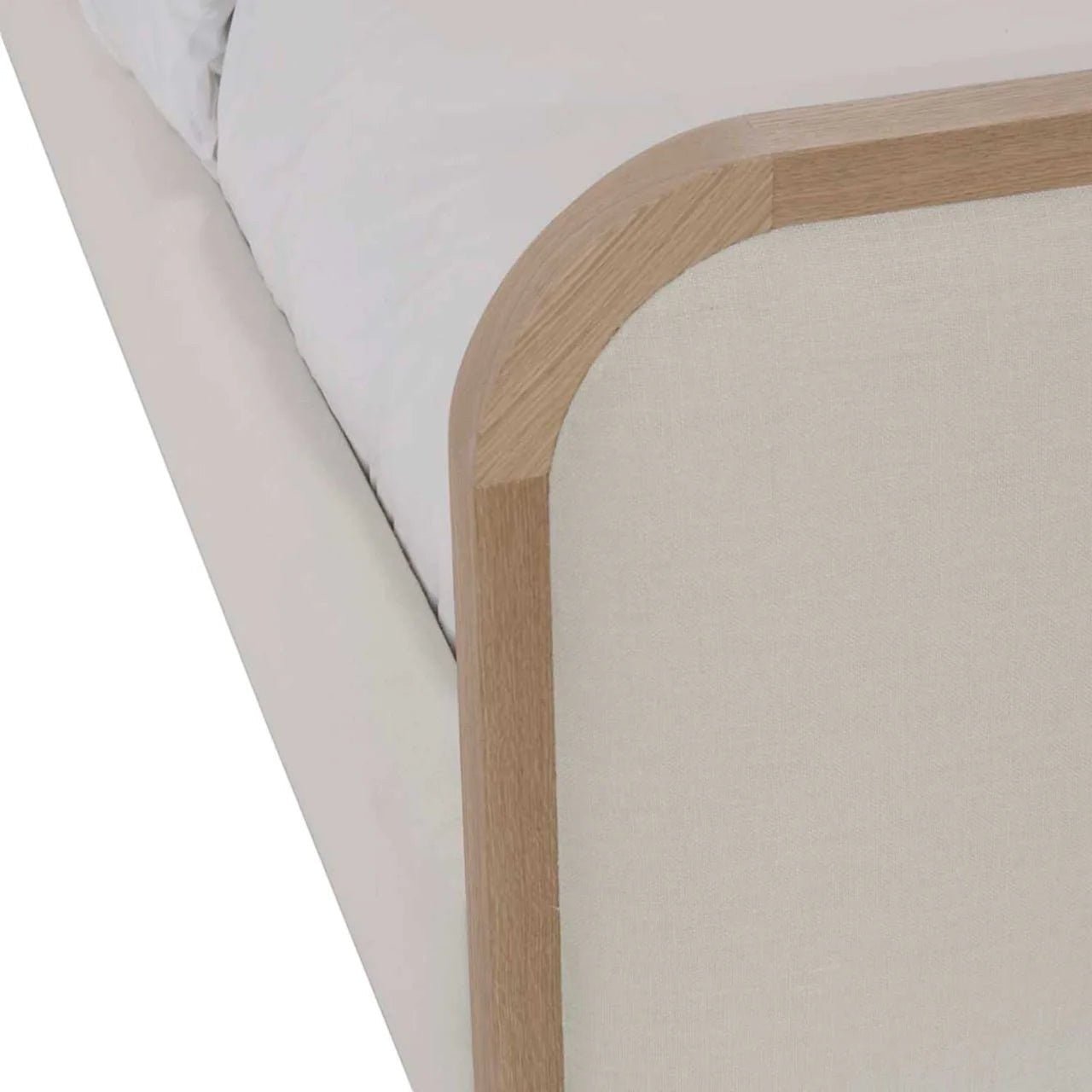 Calimia Home Vance Bed featuring a curved upholstered headboard in Belgian linen with a solid oak wood trim frame.