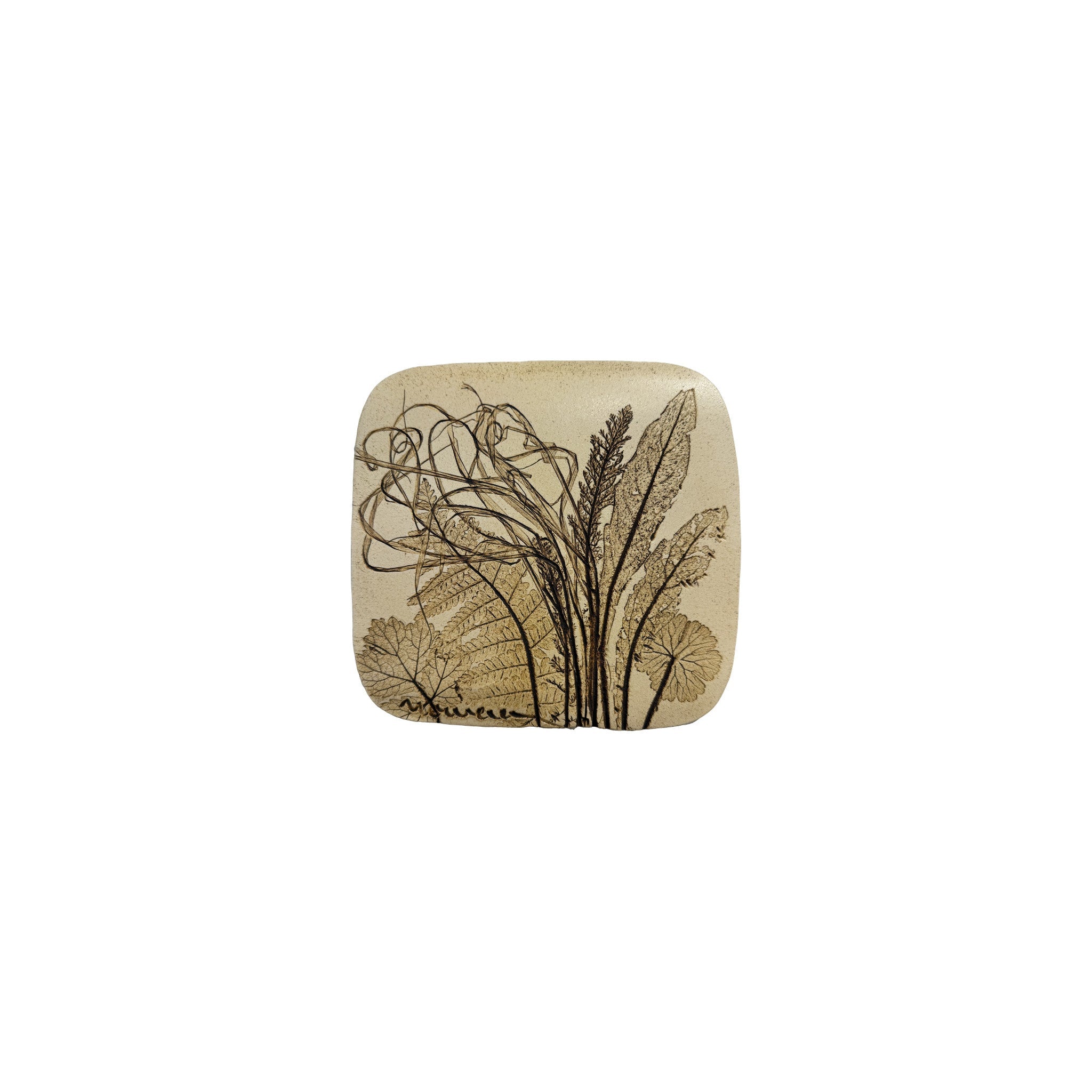 Vintage ceramic botanical wall tile with a broad fern frond, dock leaves and ribboning grasses pressed into speckled cream stoneware