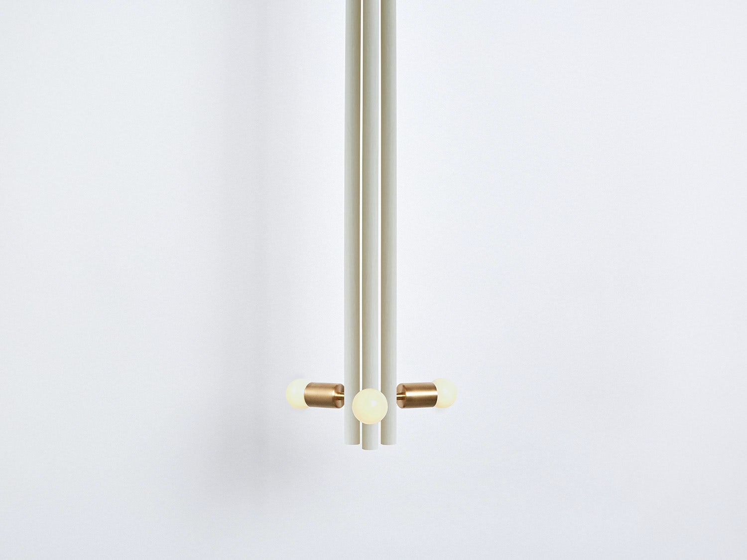 Workstead Lodge Pendant in Painted White with Hewn Brass, illuminated