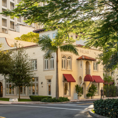 Exterior of the La Palma building in Coral Gables, Florida, home to Calimia Home's interior design studio and shop