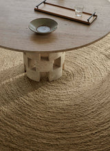 Nimbus Rug by Armadillo, hand-braided new zealand wool rug, styled in a room at Calimia Home