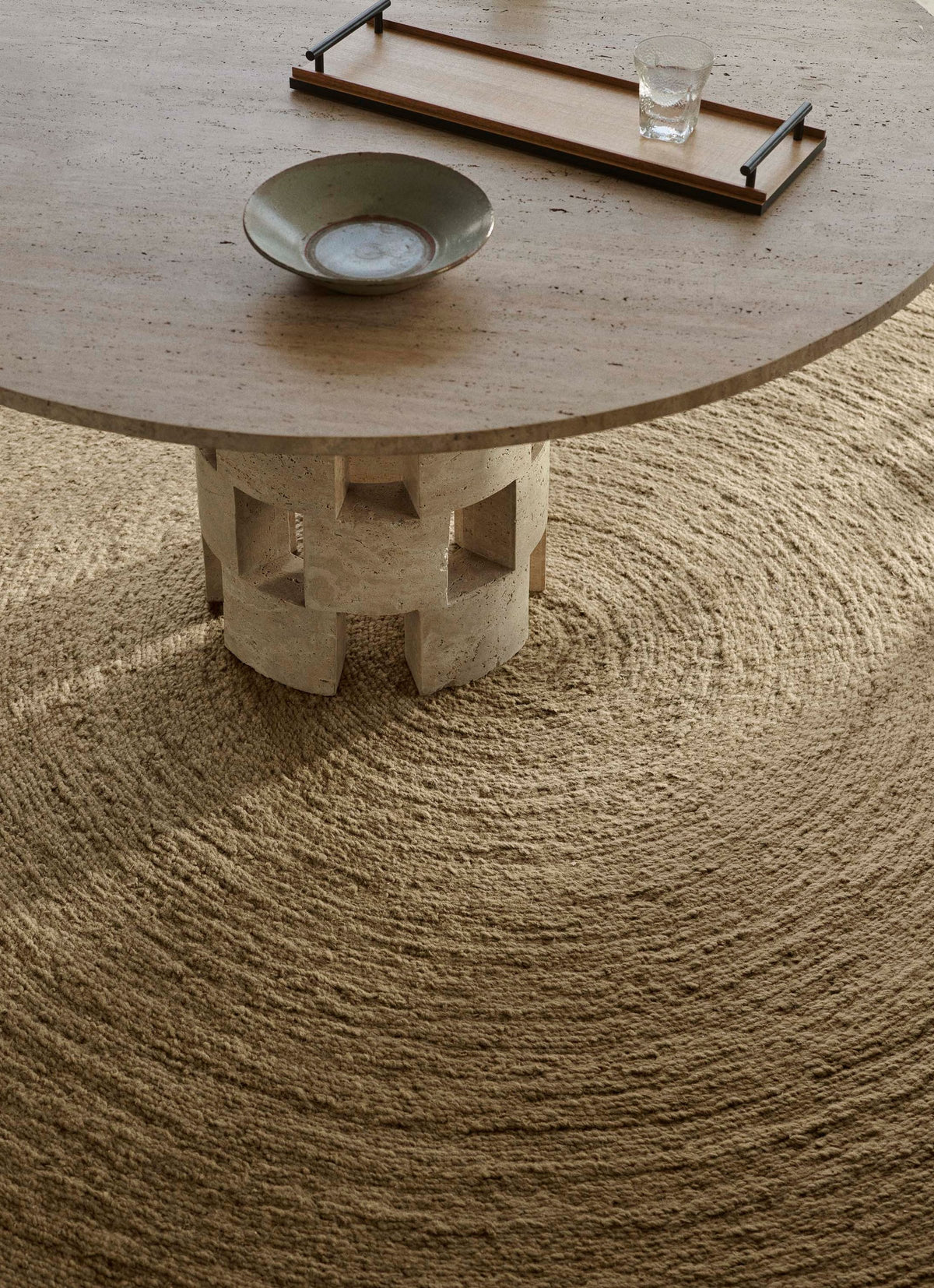Nimbus Rug by Armadillo, hand-braided new zealand wool rug, styled in a room at Calimia Home