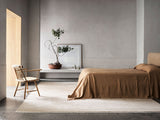 Armadillo Eden Rug in Nougat, a second view of the hand-knotted wool rug in a styled interior