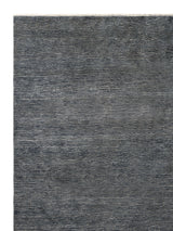 Armadillo Corsica Rug in Indigo, corner close-up of the wool and linen pile and edge