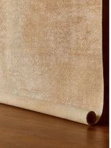 Armadillo Alma Rug in Nectar, a second view of the hand-knotted wool and silk rug in a styled interior