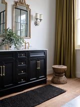 Armadillo Sahara Nook Rug in Charcoal, a second view of the double-woven jute rug in a styled interior