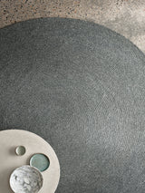Armadillo Braid Rug in Heron, detail of the wool and viscose blend weave and texture