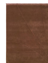 Armadillo Marea Rug in Russet, corner close-up of the wool pile and edge