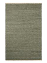 Armadillo Cable Rug in Jade, overhead view of the handwoven soumak wool weave and edge finish