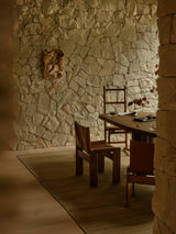 Armadillo Selva Rug in Silt, handwoven afghan wool kilim rug shown in a room setting