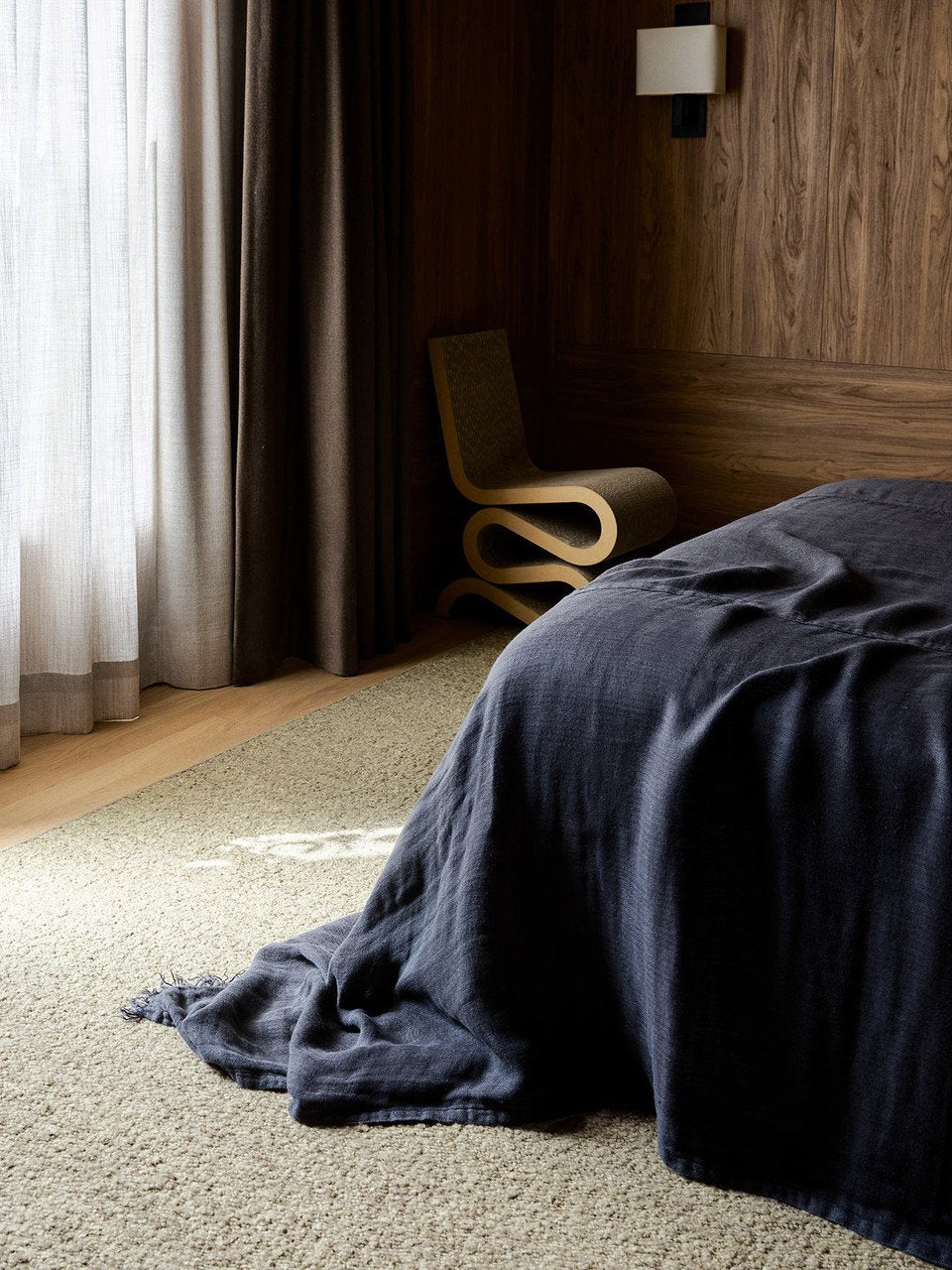 Pebble Rug by Armadillo, handwoven boucle wool rug, styled in a room at Calimia Home