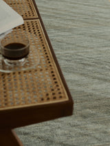 Armadillo Odessa Rug in Partridge, a second view of the hand-knotted afghan wool rug in a styled interior
