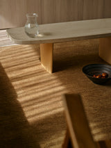 Armadillo Thatch Rug in Maize, hand-knotted wool rug shown in a room setting