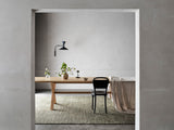 Armadillo Staccato Rug in Olivine, hand-knotted silk and linen rug shown in a room setting