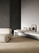 Armadillo Corsica Rug in Paperbark, handwoven wool and linen rug shown in a room setting