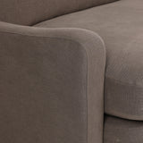 Close-up of Broadway Coffee 100% flax linen upholstery on the Aurelia sectional, showing the deep coffee brown weave and reversible boxed cushion casing