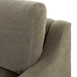 Close-up of Broadway Olive 100% flax linen upholstery on the Aurelia sectional, showing the muted olive green weave and reversible boxed cushion casing