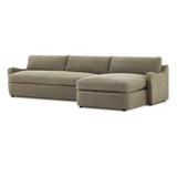 Amber Lewis x Four Hands Aurelia sectional in Broadway Olive linen styled in a living room, right-facing chaise extended across a 128-inch span