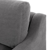 Close-up of Broadway Denim 100% flax linen upholstery on the Aurelia sectional, showing the faded indigo blue weave and reversible boxed cushion casing