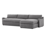 Amber Lewis x Four Hands Aurelia sectional in Broadway Denim linen styled in a living room, right-facing chaise extended across a 128-inch span